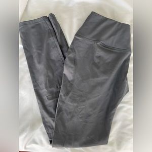 Dark pale blue gym leggings. Emphasizes booty